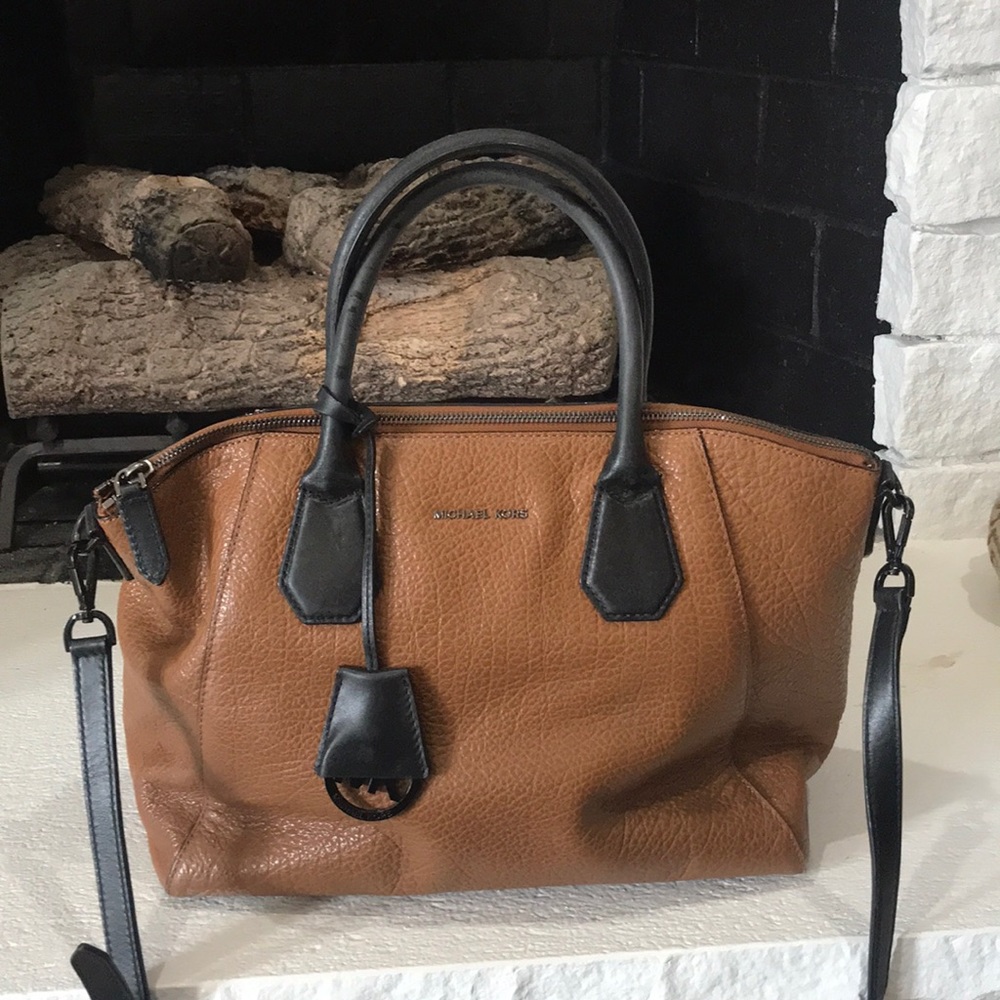 Michael Kors brown leather with black trim purse